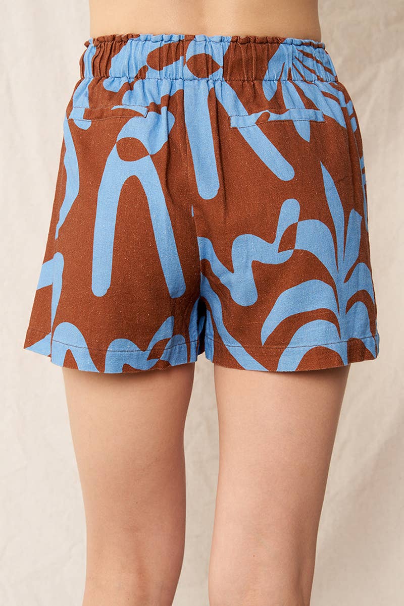 Tropical Geometric Elastic Shorts