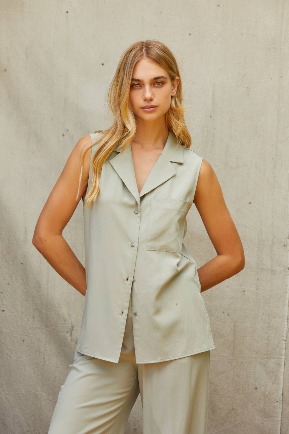 Sleeveless Collared Button Down